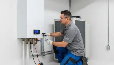 Technician performing boiler repair in Alexandria, VA home for Five Star Cooling service page